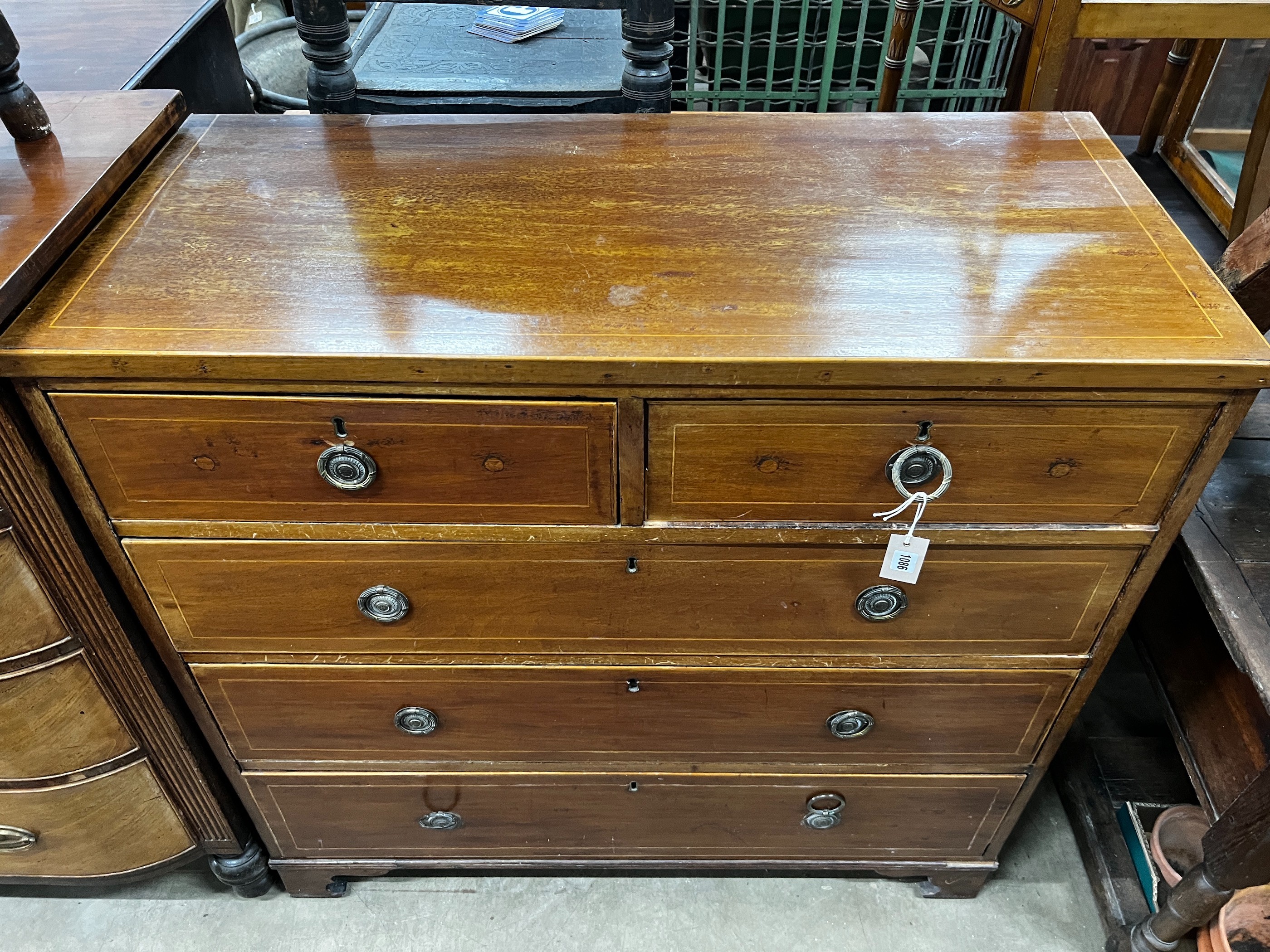 A Regency inlaid mahogany chest of drawers, width 108cm, depth 49cm, height 104cm